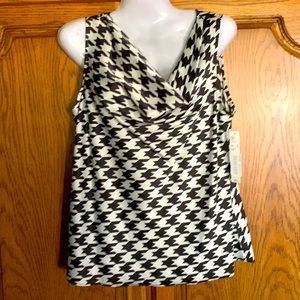 Houndstooth silky black and white sleeveless top. New with tags